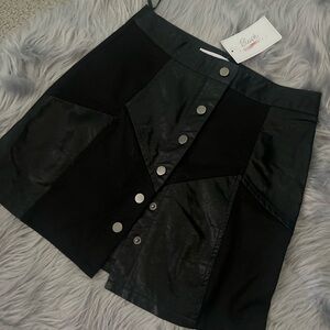 Beautiful leather mini skirt.